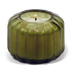 The Secret Garden Small Ribbed Glass Candle by Paddywax is designed to elevate tablescapes.   Bring a vintage touch to your next dinner party with these subtle and finely ribbed coloured glass vessels, available in both small and large sizes.  With a focus on sustainability, a repurposing tip is to try using the vessel as a votive for tea lights.  Top Notes: Sea Salt, Dewy Melon, Lemon Middle Notes: Violet, Freesia Base Notes: Musk, Driftwood
