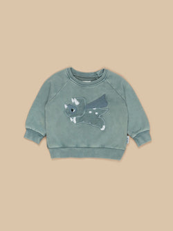 The Super Dino Sweatshirt by Huxbaby has cool and comfy covered!  Complete with a washed garment slate dyed finish and super dino appliqué. This wardrobe essential is made from a super soft, GOTS certified organic cotton, perfect for everyday wear!  Made from gots certified organic cotton Sustainably produced Safe azo free dyes Cold gentle machine washable Packaged in a 100% recycled LDPE bag Designed in Melbourne, Australia by Huxbaby