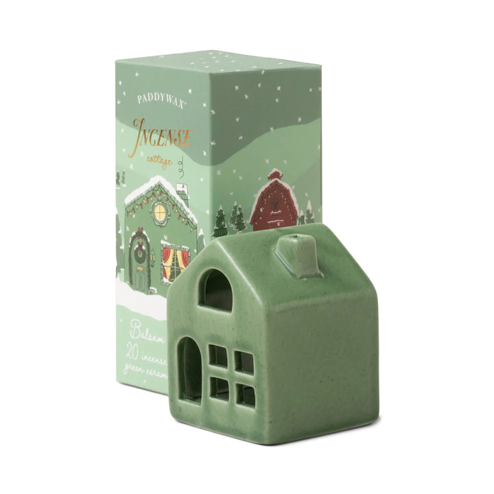 Inspired by iconic scenes of Christmas villages, the Green Ceramic Cottage Incense Holder by Paddywax brings the scents of the holiday season into your home in a whole new way with an amazing Balsam & Fir fragrance.  *Includes 20 Incense Cones  *Ceramic vessel  *Dimensions: 1.88 L x 1.88 W x 3.83 H inches  *Designed by Paddywax in USA